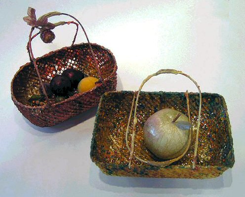 Dream Baskets, in metal and fiber, by Margie Hughto.